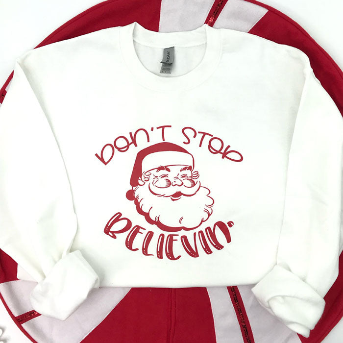 Santa Don’t Stop Believin Crewneck